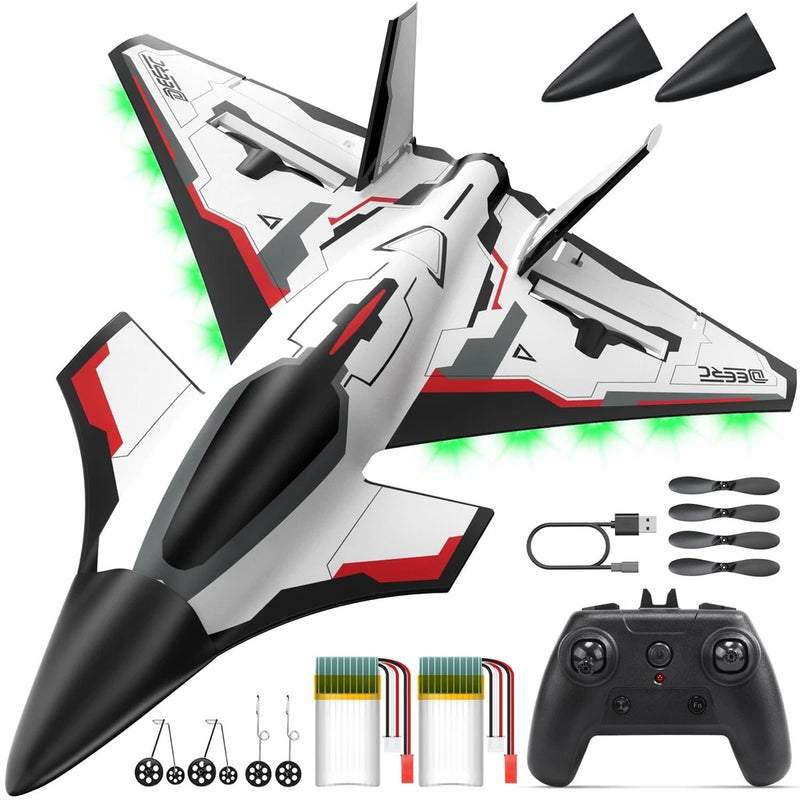 DEERC RC fighter jet with green LED lights, remote control, and propeller set