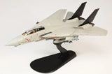 White F-14A Tomcat model aircraft with black wings and missiles on a black display stand