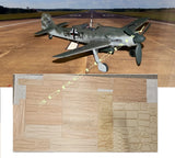 Laser-cut balsa ply aircraft kit with gray-green FW-190 model plane and parts sheet