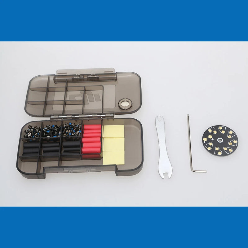 Tooling box case with open compartments, circular tool, hex key, and fork wrench