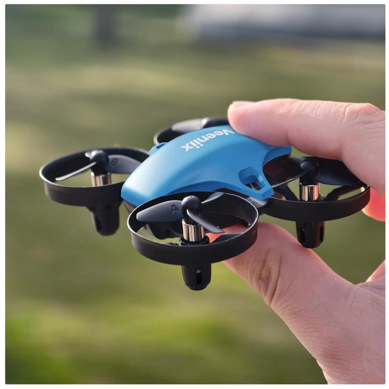 Mini quadcopter drone with blue body and black protective prop guards