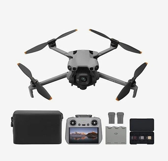 Foldable camera drone with four propellers and controller, plus case and batteries