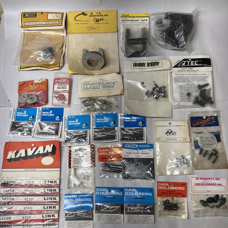 Vintage RC airplane glow parts and accessories lot in sealed plastic bags