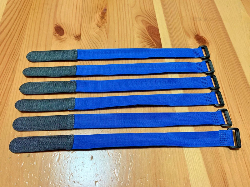 Rubberized battery straps 6-pack, blue straps with black ends and metal buckles