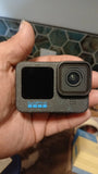 GoPro HERO waterproof action camera in black with front display and wide lens