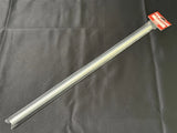 RC helicopter tail boom, silver cylindrical tube with red label