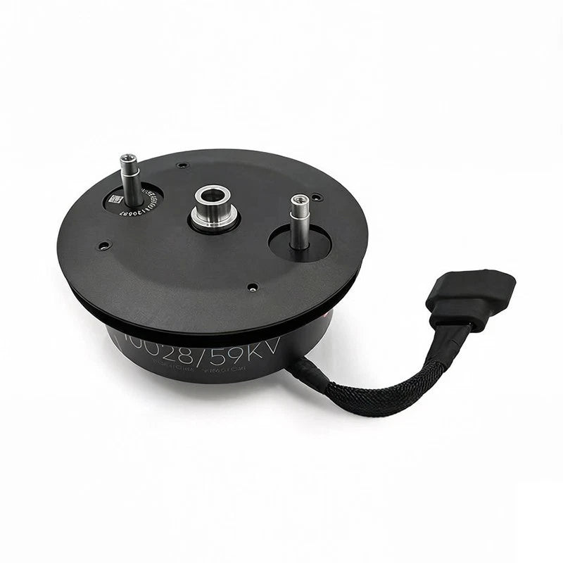 Black circular drone propulsion motor with mounting posts and attached cable