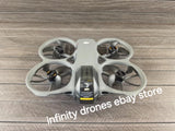 DJI replacement drone body: white quadcopter frame with four propellers