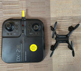 Sharper Image DX-2 rechargeable remote quadcopter with handheld controller and four rotors