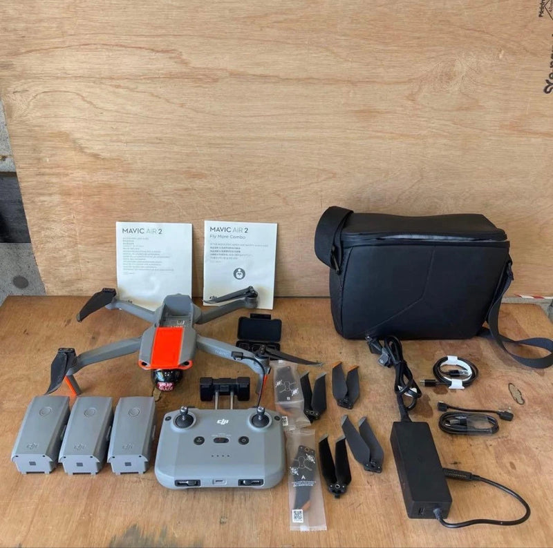 DJI Mavic Air 2 drone kit with remote controller, batteries, charger, and carrying case
