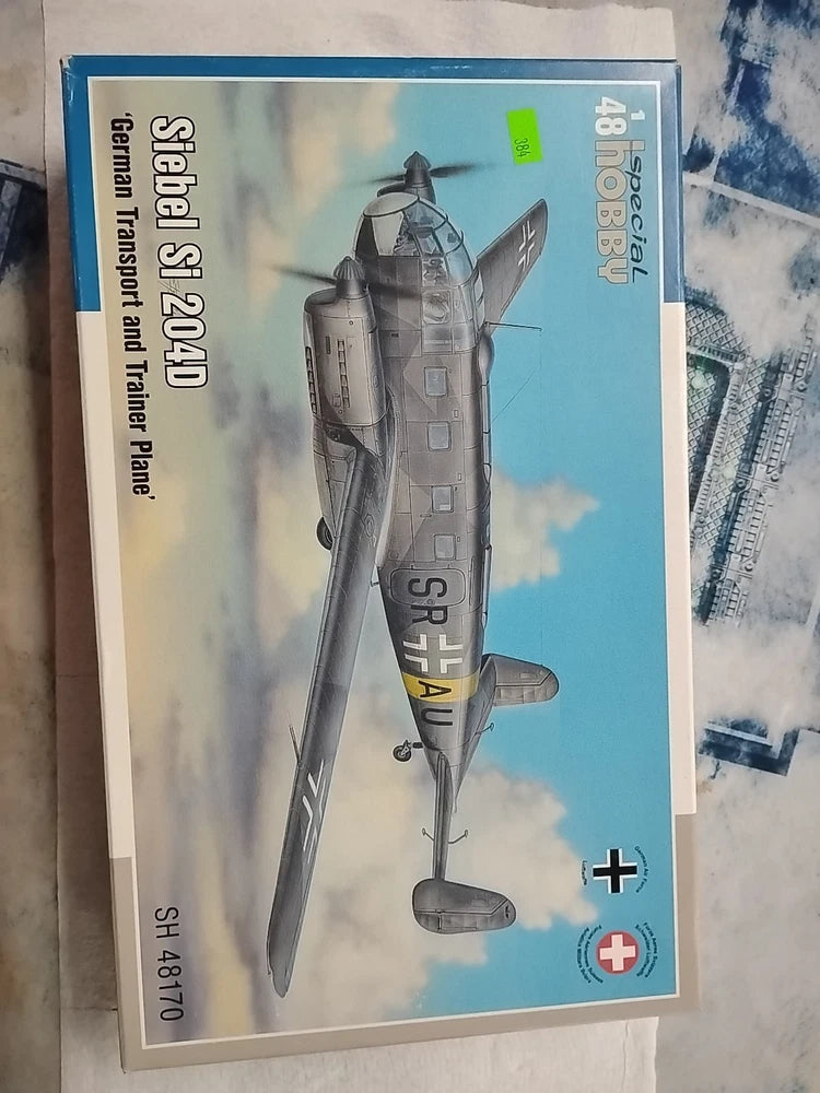 1:48 scale twin-engine aircraft model kit box, showing gray Siebel Si 204E illustration
