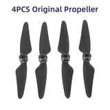 4-pack drone propellers with dark blades and central hubs