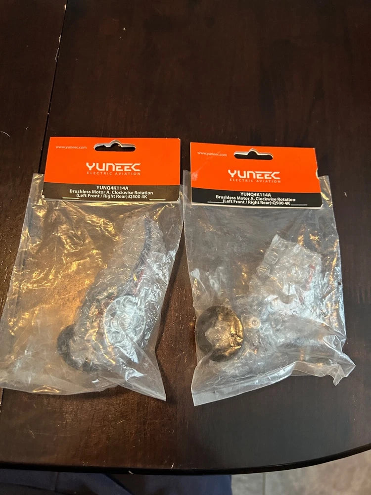 Yuneec brushless motor, two sealed packages with orange labels