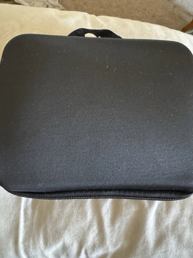 Black zippered soft drone carrying case with smooth top panel