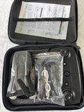 Open zippered carrying case with foldable RC drone, remote, and spare parts