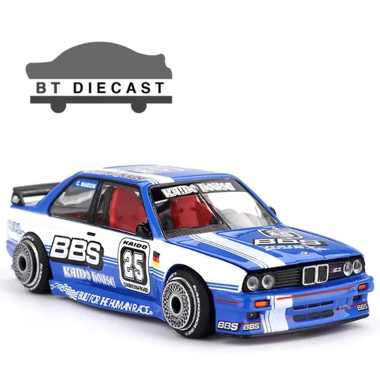 Blue and white racing die-cast model car with BBS wheels and BMW front grille