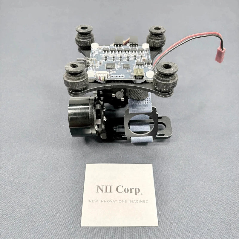 DJI Phantom 2 black gimbal motor assembly with circuit board and red wire
