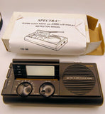 SPECTRA vintage digital AM/FM alarm clock radio with LCD display and speaker grille