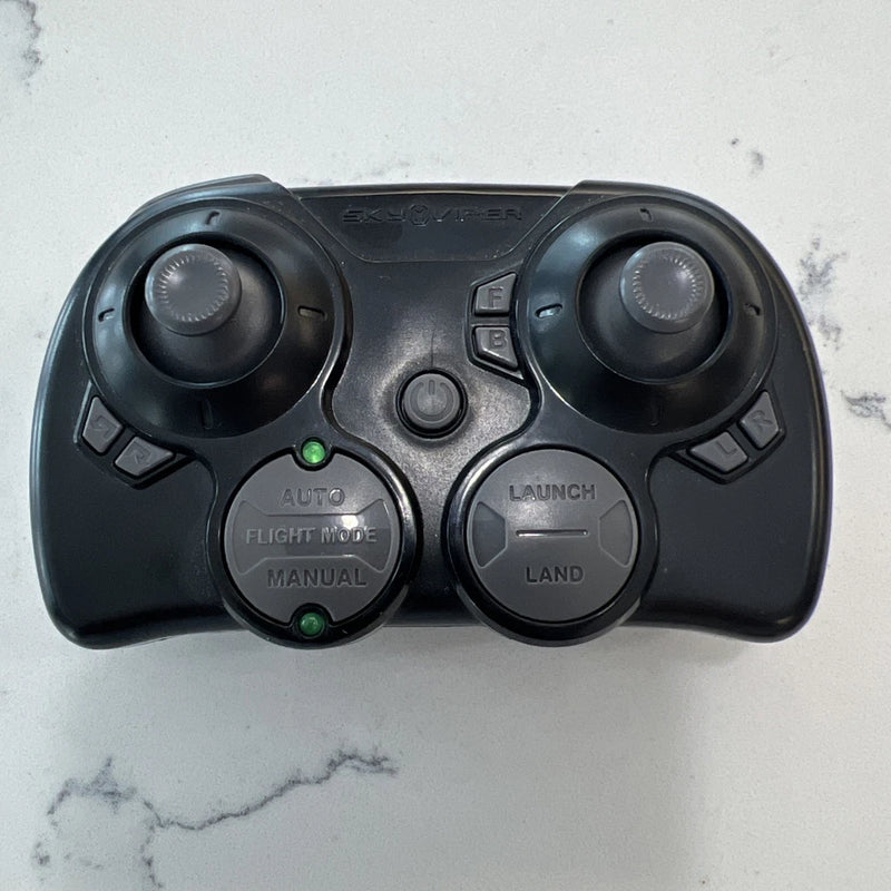 Dark gray Sky Viper drone remote controller with launch and land buttons