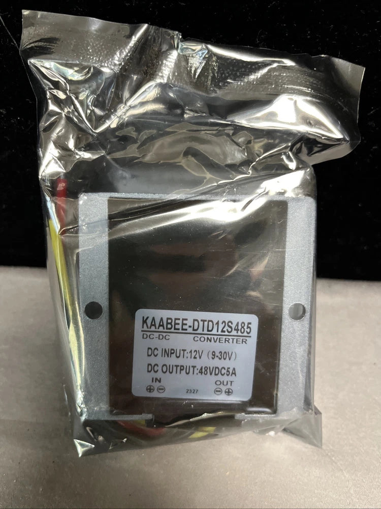 DC-DC converter module KAABEE-DTD12S485 in sealed bag, shows 12V in and 9-30V out