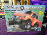 MPC monster truck modeling kit box with orange Volkswagen-style vehicle and motor power