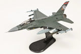 F-16C model aircraft with gray-green camouflage, side view, missiles, on display stand