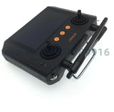 Black drone remote controller with LCD screen and dual joysticks