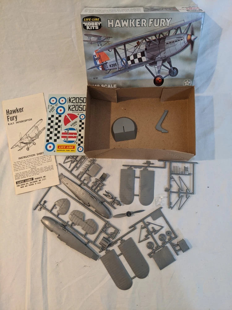 Hawker Fury 1/48 scale airplane model kit with plastic parts, decals, and instructions