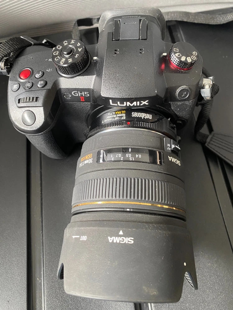Panasonic GH5 Mk 2 body. Mint condition with 'small rig' frame & original box