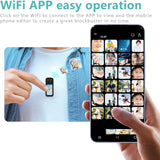 Mini action camera with WiFi app on smartphone screen, hands tapping preview