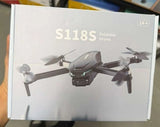 Foldable RC drone with four propellers, shown on retail box, S118S model
