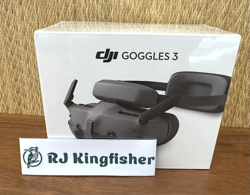 DJI Goggles 3 accessory box with headset and side controllers on white packaging