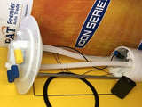 In-tank fuel pump module with white housing and electrical wiring connectors