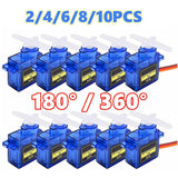 SG90 micro servo motor set, blue cases, signal wire; labeled 180° and 360°