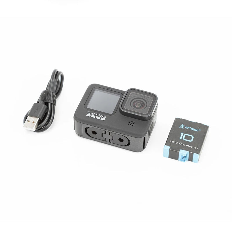GoPro HERO9 Black action camera with front screen, USB cable, and memory card