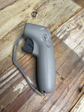 Dji FPV motion controller, grey handheld with trigger buttons and wrist strap
