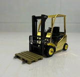 1:25 diecast forklift model with gold body, black mast, and raised forks