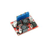 DC auto buck/boost converter module PCB with blue terminal blocks and IC components