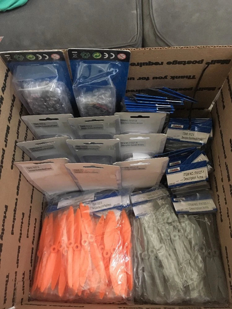 RC chaser race drone quadcopter parts in retail box, sealed bags and orange prop blades
