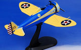 1:48 scale blue and yellow P-26A model airplane on display stand with star markings