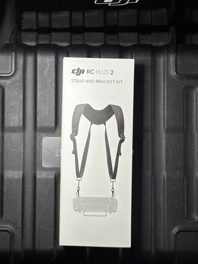 DJI RC Plus 2 strap and bracket kit card with harness and bracket illustration