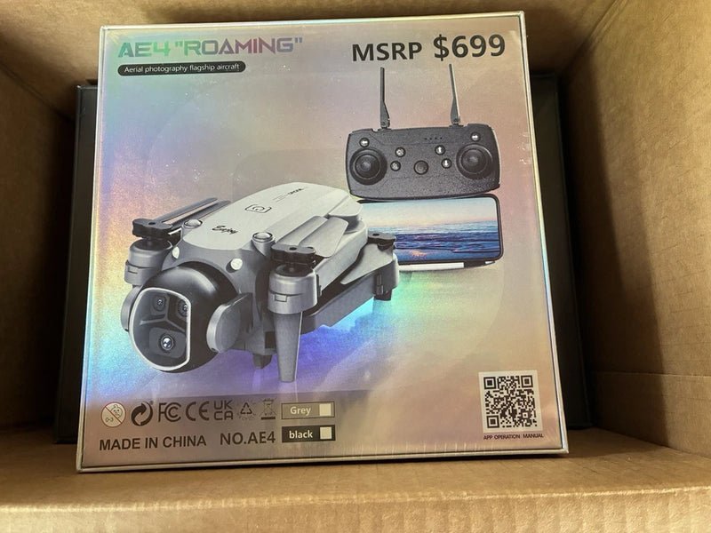 Ready-to-fly drone kit in retail box, featuring gray quadcopter and controller