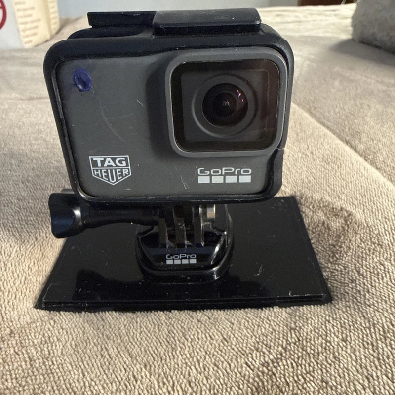 GoPro HERO7 Black action camera with front lens and mounting bracket