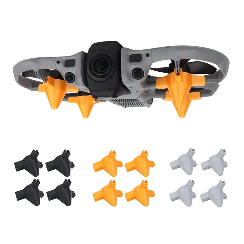 Drone landing gear protector set with raised orange feet and spare gear pieces