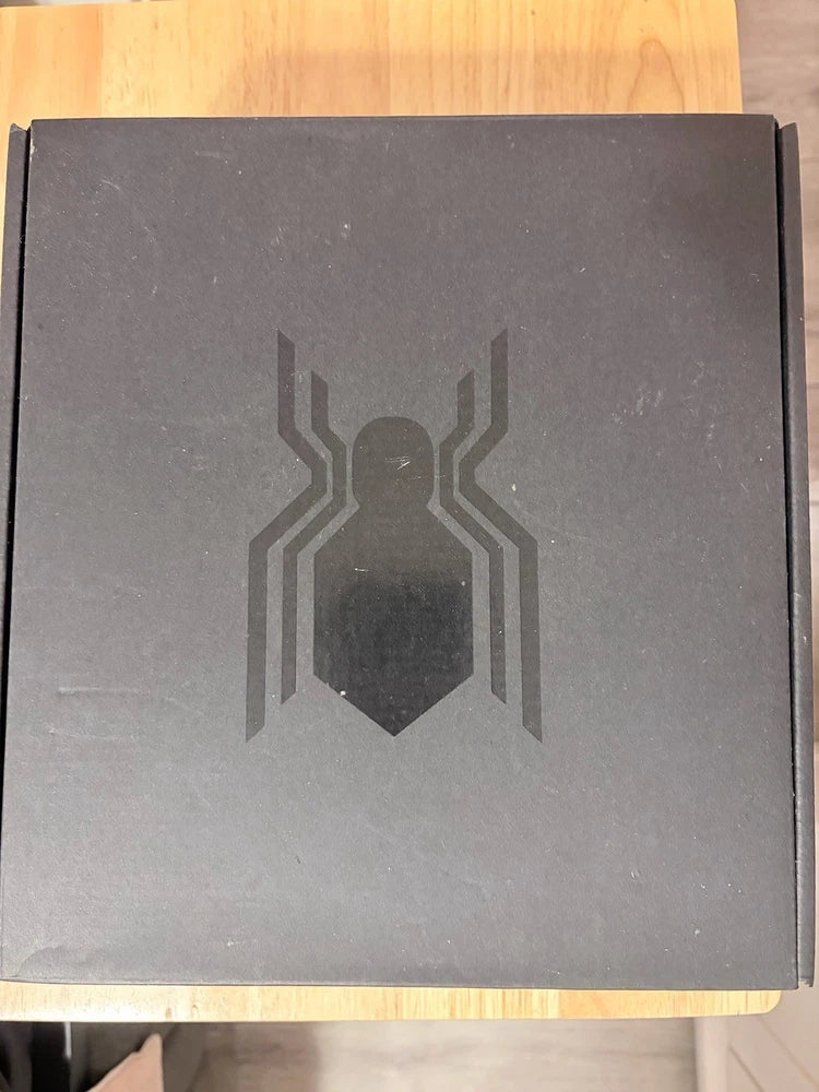 Black drone quadcopter packaging box with spider emblem
