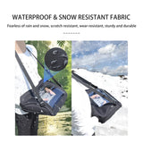 Black waterproof touchscreen gloves for drone controller, worn with controller strap