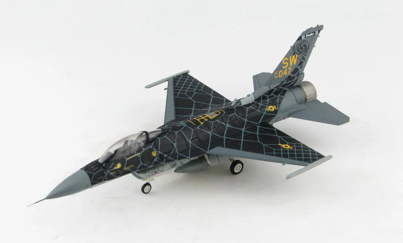 F-16C scale model jet with dark gray web camouflage, landing gear down, angled view