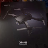 YOMI drone with 4K camera, shown on product box with obstacle avoidance text