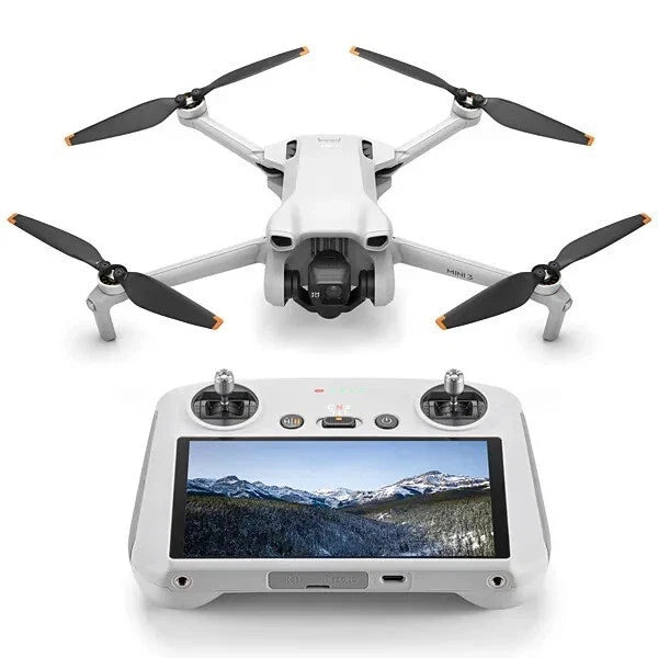 White quadcopter drone with four propellers and a handheld remote controller with screen