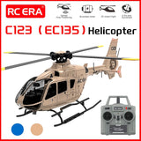 RC helicopter model with beige body, black skids and blades; includes gray remote controller